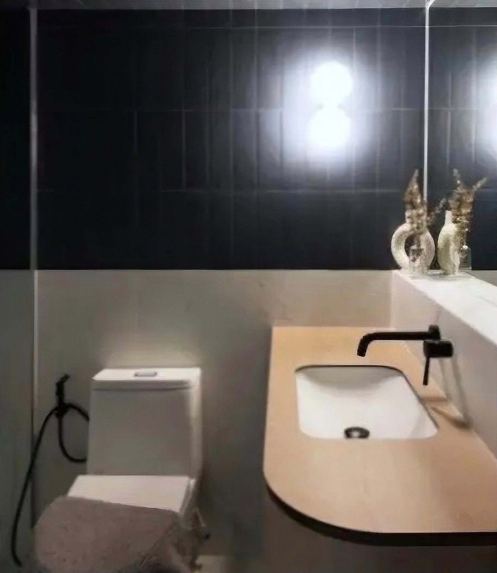 After — Kamar mandi · aksen biru Kemang Village